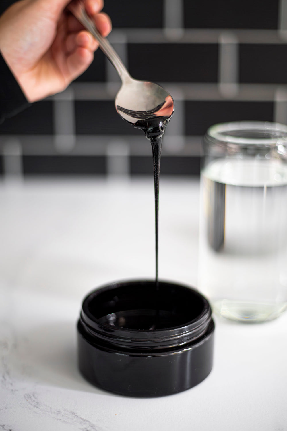 Scooping Black Lotus Shilajit resin